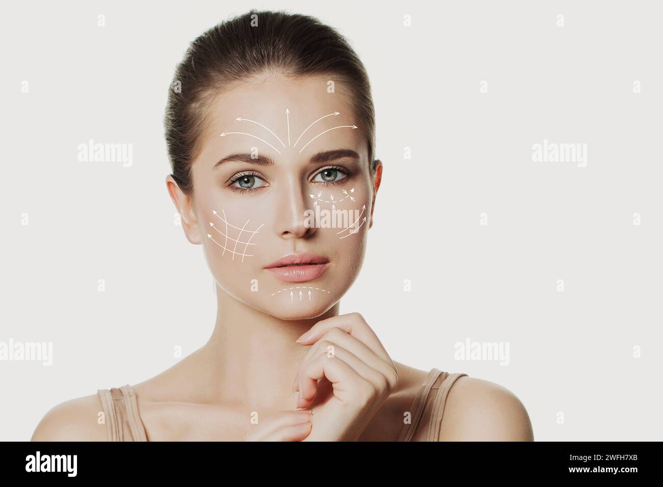 Graphic lines shows face lifting effect on young female face Stock