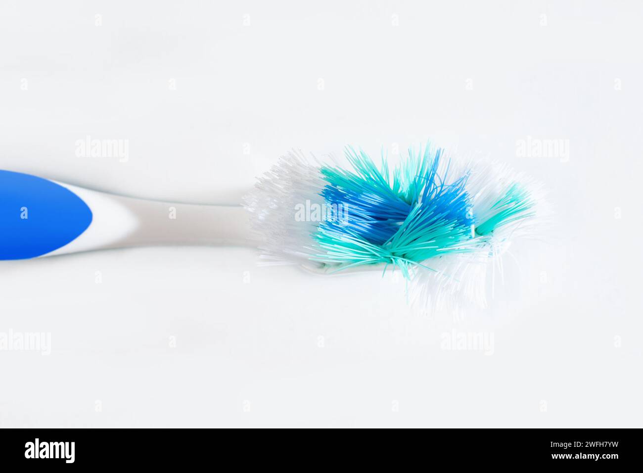 used toothbrush isolated on white background Stock Photo