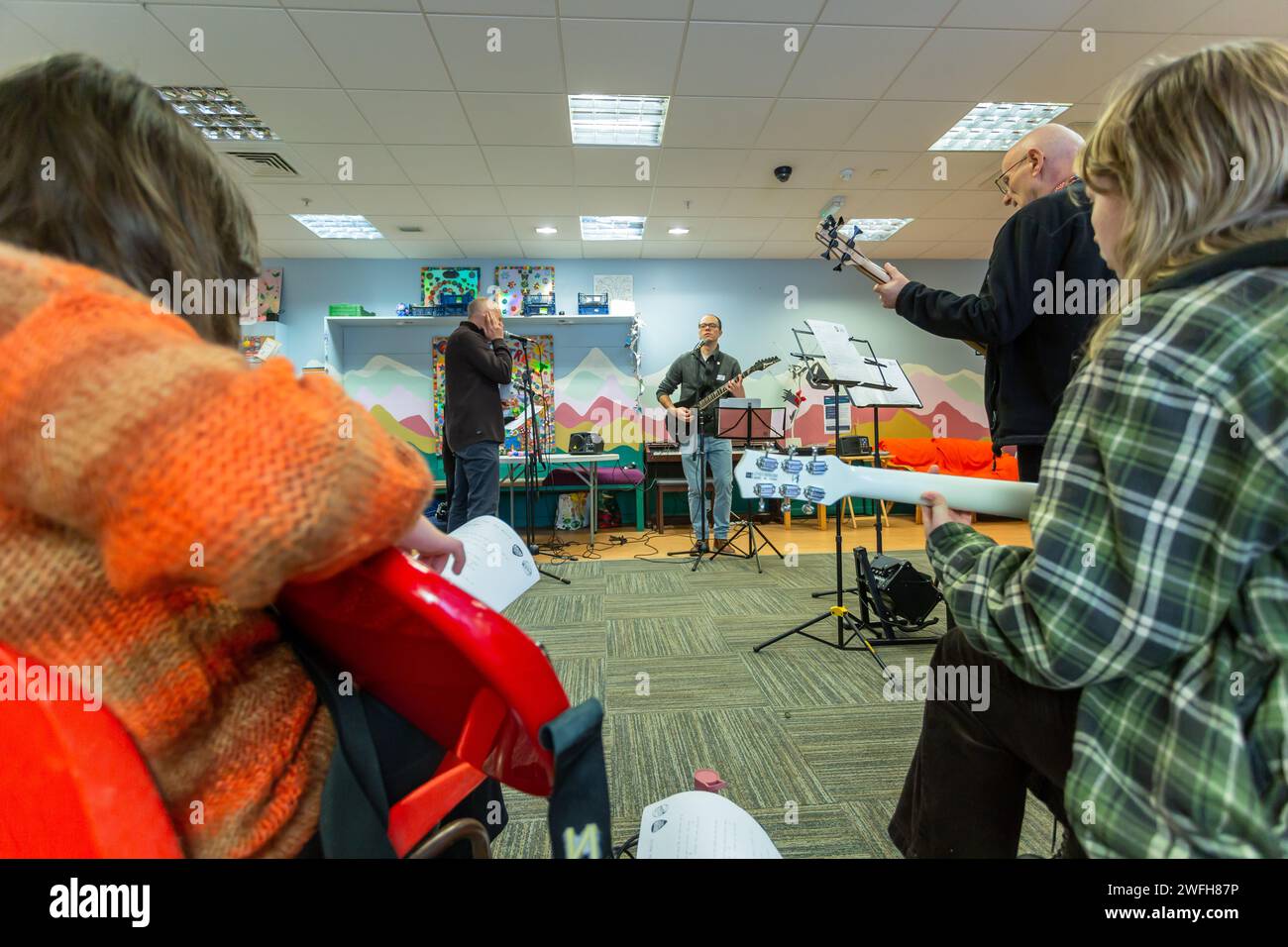 Older people playing instruments Stock Photo