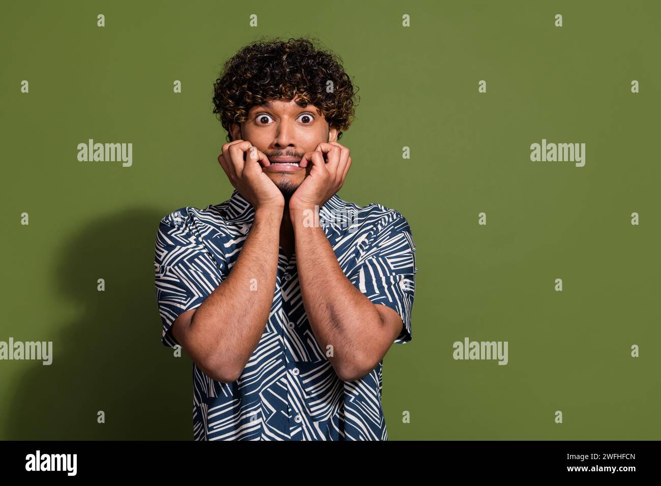 Scared Arm Photo of scared frightened man dressed print shirt hands arms cheeks ...