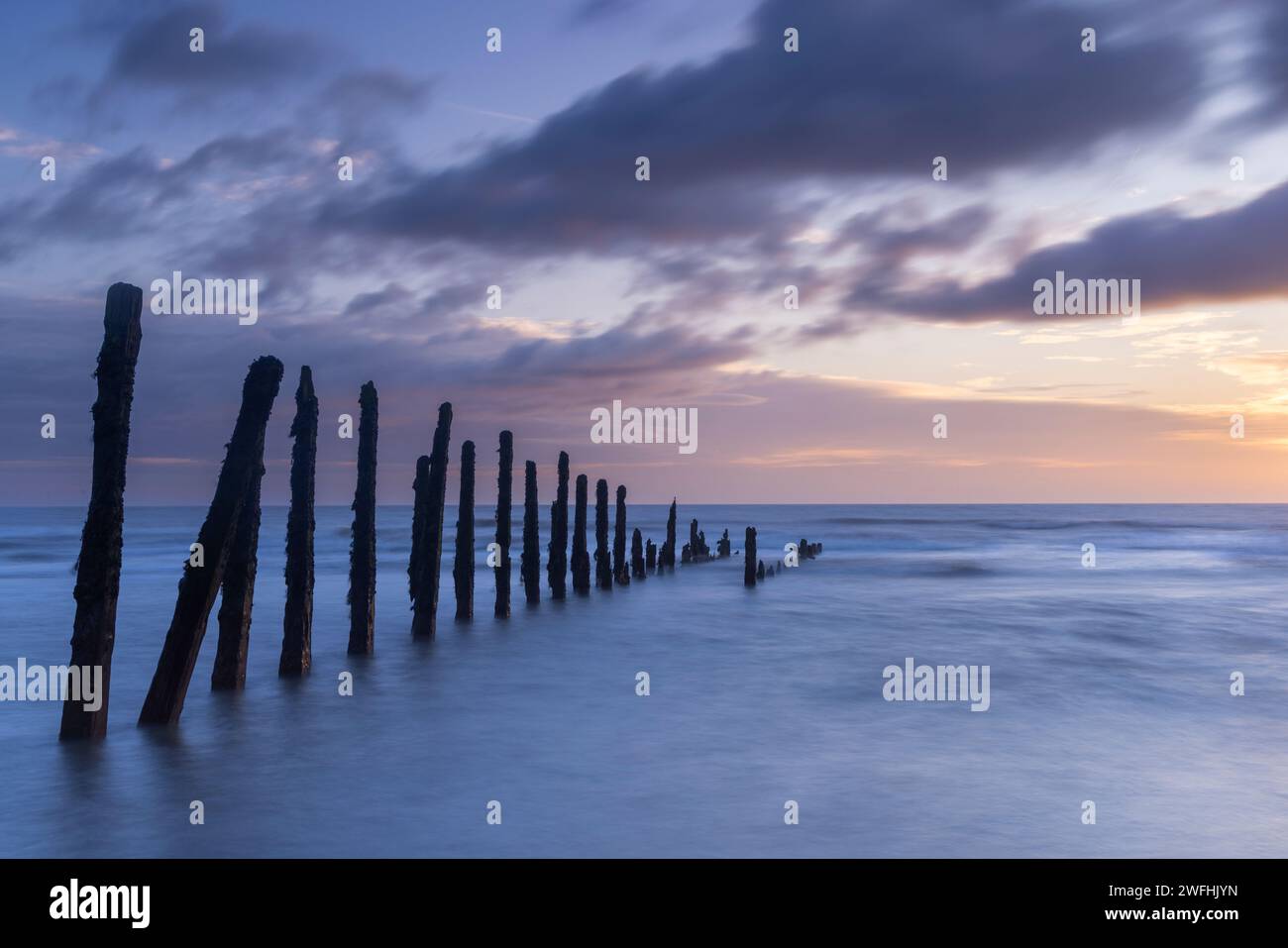 Sea defences at Spurn Point at sunrise. Kilnsea, Humberside, East Yorkshire, UK Stock Photo