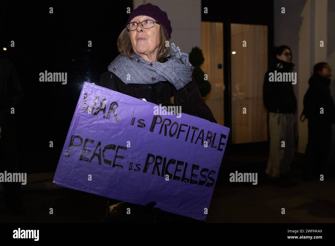 London, UK. 30th January, 2024. A campaigner against the arms trade protests outside the JW Marriott Grosvenor House Hotel on the occasion of the ADS Annual Dinner. The ADS Annual Dinner brings together representatives of companies from the UK's aerospace, defence, security and space industries. Sponsors of the event include BAE Systems which supplies components for F-35 combat aircraft used by Israel during its invasion of Gaza. Credit: Mark Kerrison/Alamy Live News Stock Photo
