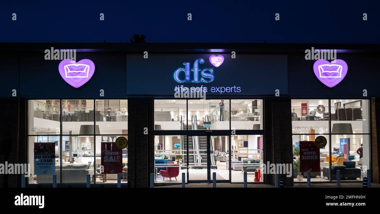 DFS sofas shop entrance taken at night. Illuminated and lit up taken from the outside of the store looking in. Stock Photo