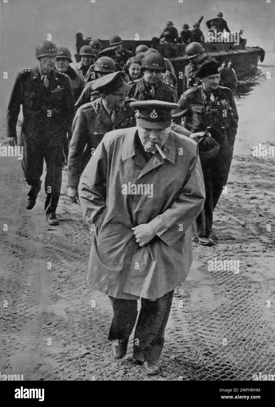 On the 25th March 1945, Prime Minister Winston Churchill along with General Mongomery crossed the River Rhine, Germany on a landing craft during the final days of the Second World War in Europe. Stock Photo