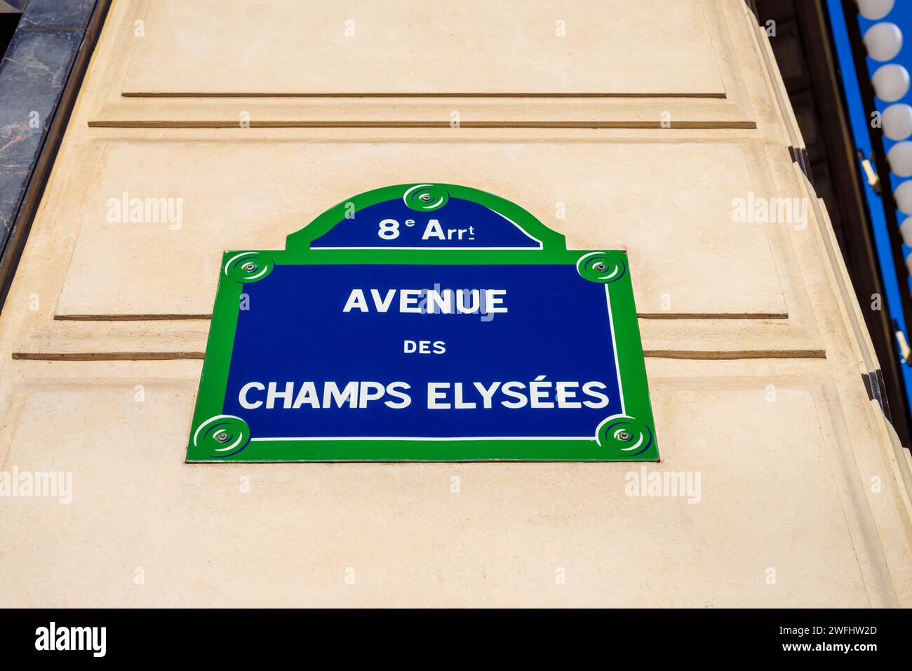 Avenue Des Champs Elysées Road Sign on Facade in Paris France Stock Photo