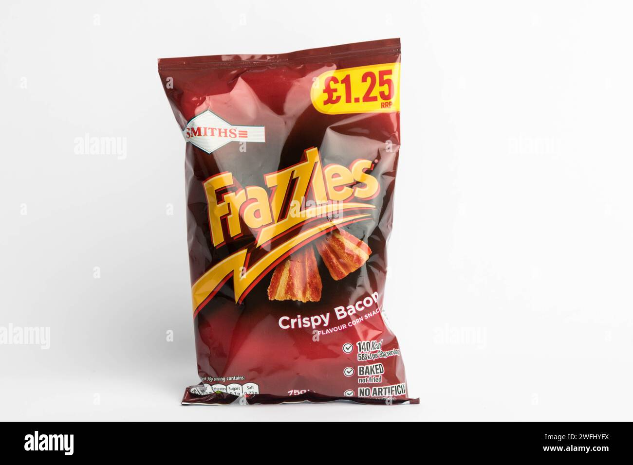 London, United Kingdom, 29th January 2024:- A packet of Smiths Frazzles Crispy Bacon British Potato Snacks on a white background Stock Photo