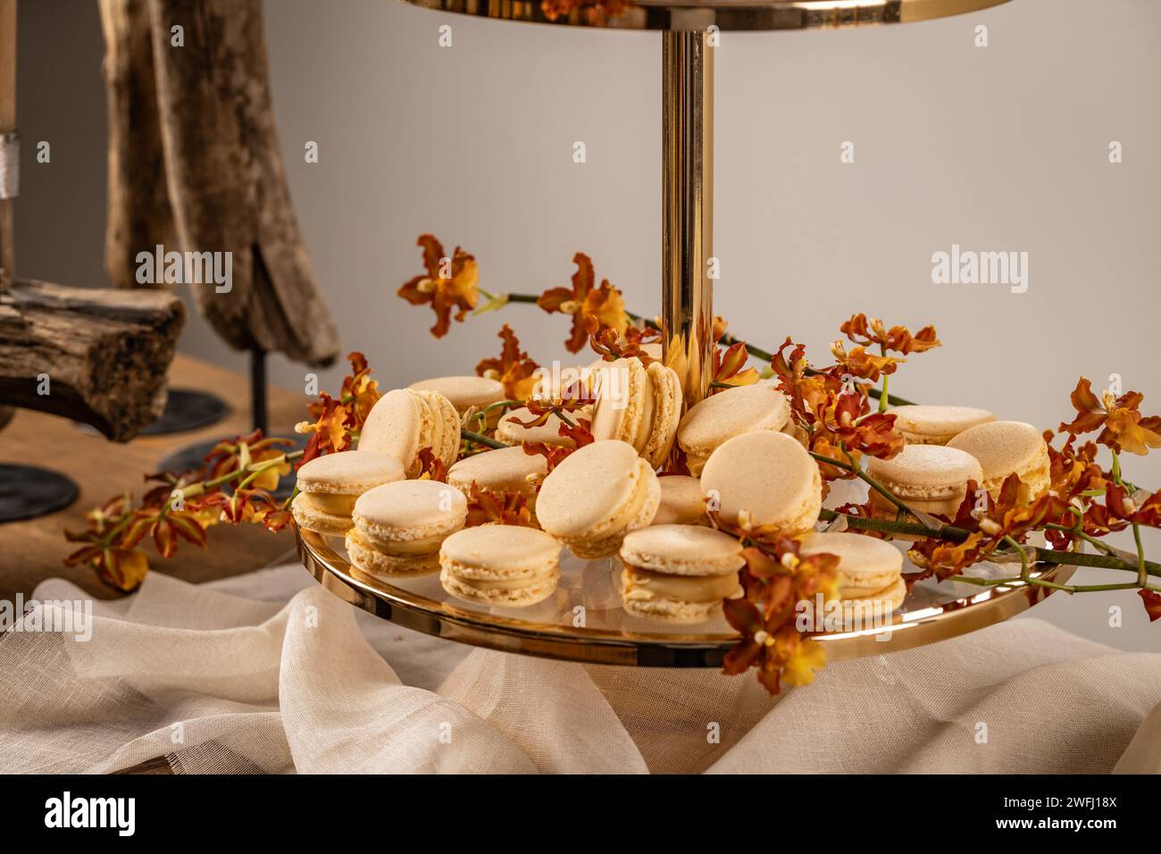 Sweet pastel colored macarons on festive table Stock Photo