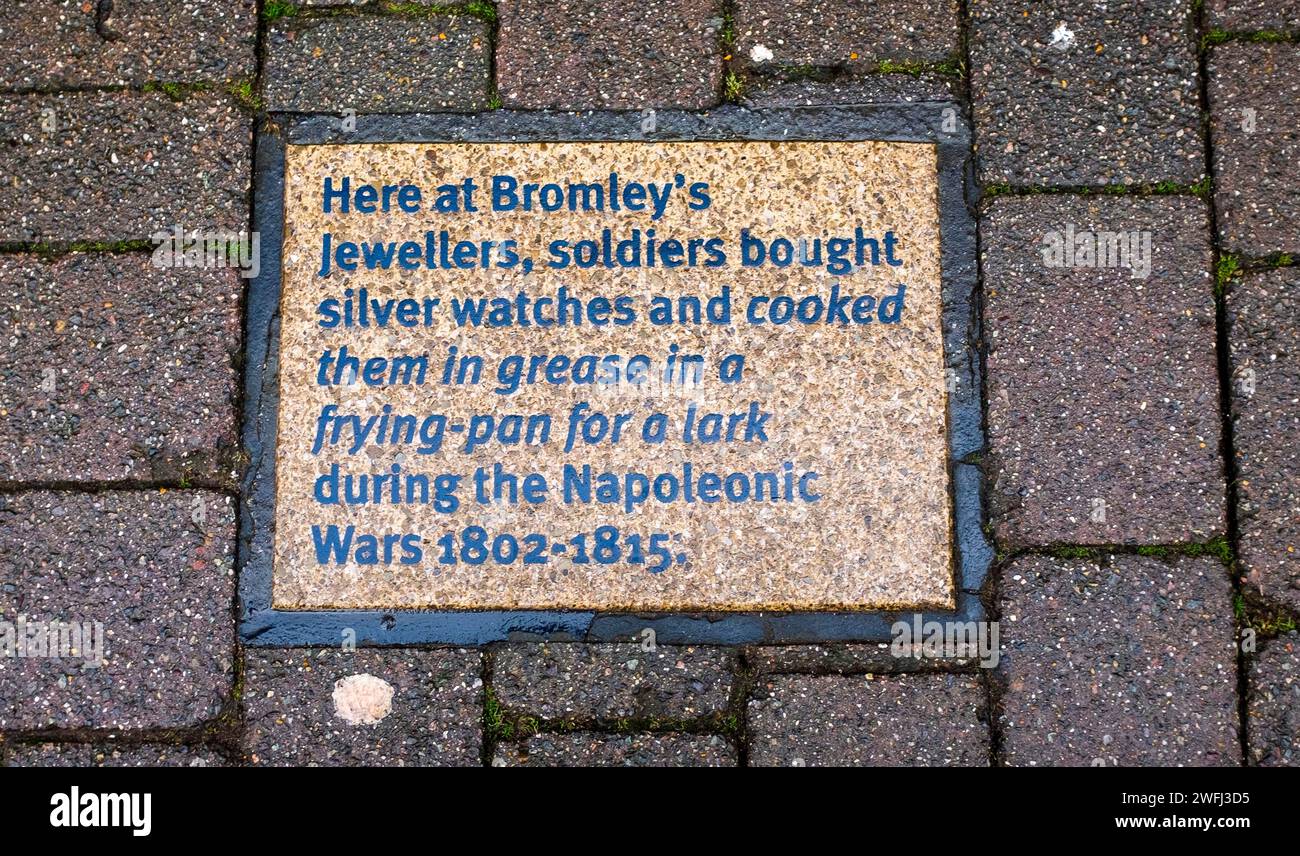 Tourism plaques in the pavement in Middle Street Horsham , West Sussex , England UK . This one for Bromley's Jewellers where soldiers bought items in Napoleonic Wars of 1802 - 1815 Stock Photo