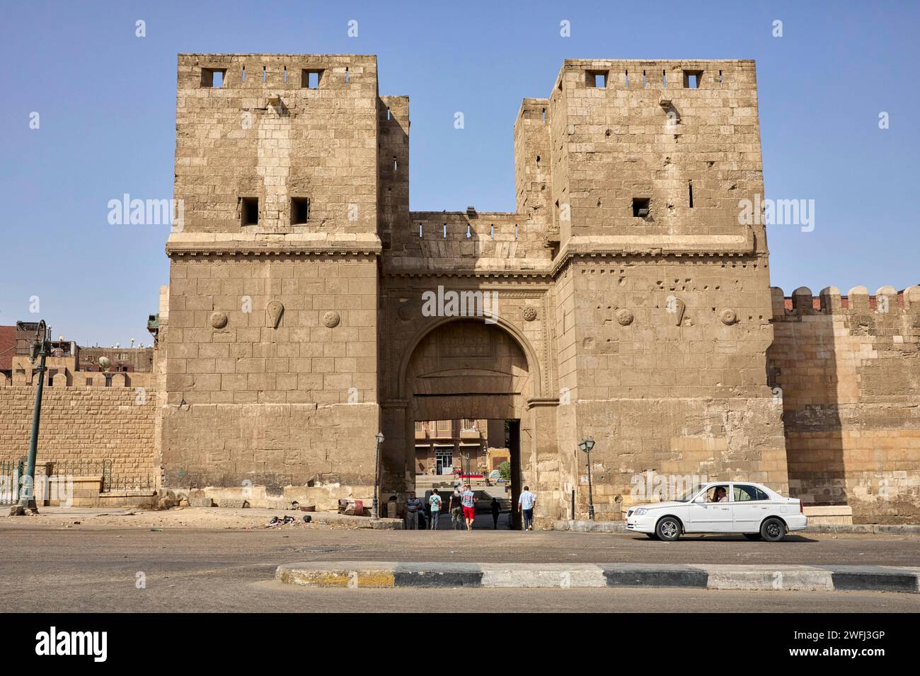 Fatimid City Wall Bab al-Nasr Gate Al Banhai Street in Cairo, Egypt Stock Photo
