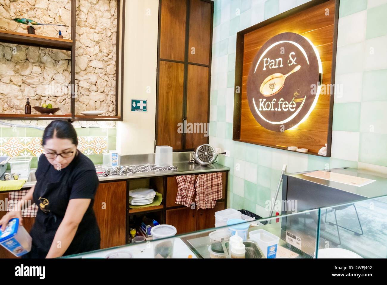 Merida Mexico,Zona Paseo Montejo Centro,Pan & Koffee Kof.fee cafe coffee shop,inside interior,woman women lady female,adult adults,resident,residents, Stock Photo