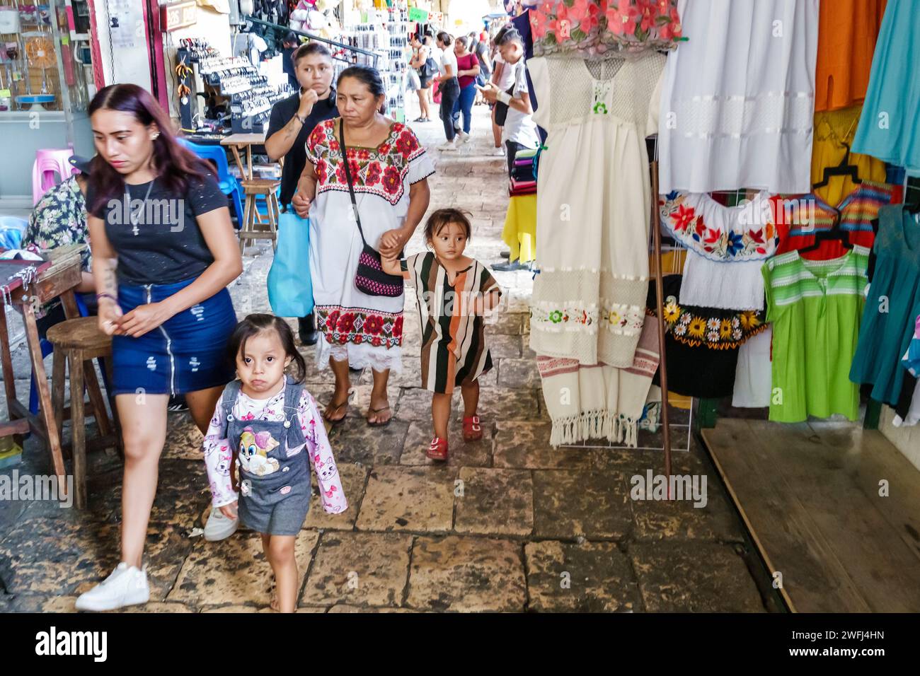 Merida Mexico,centro historico central historic district,Calle 56A,shopping district,Lucas de Galvez mercado market,Portal Granos,family father mother Stock Photo