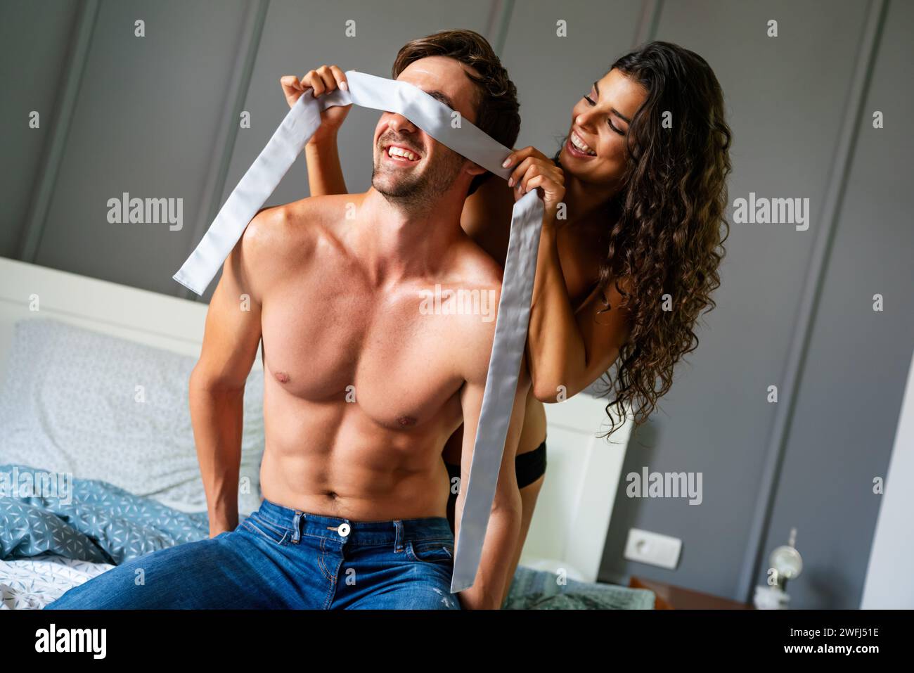 Sexy couple play in love games. BDSM. Woman and man playing domination