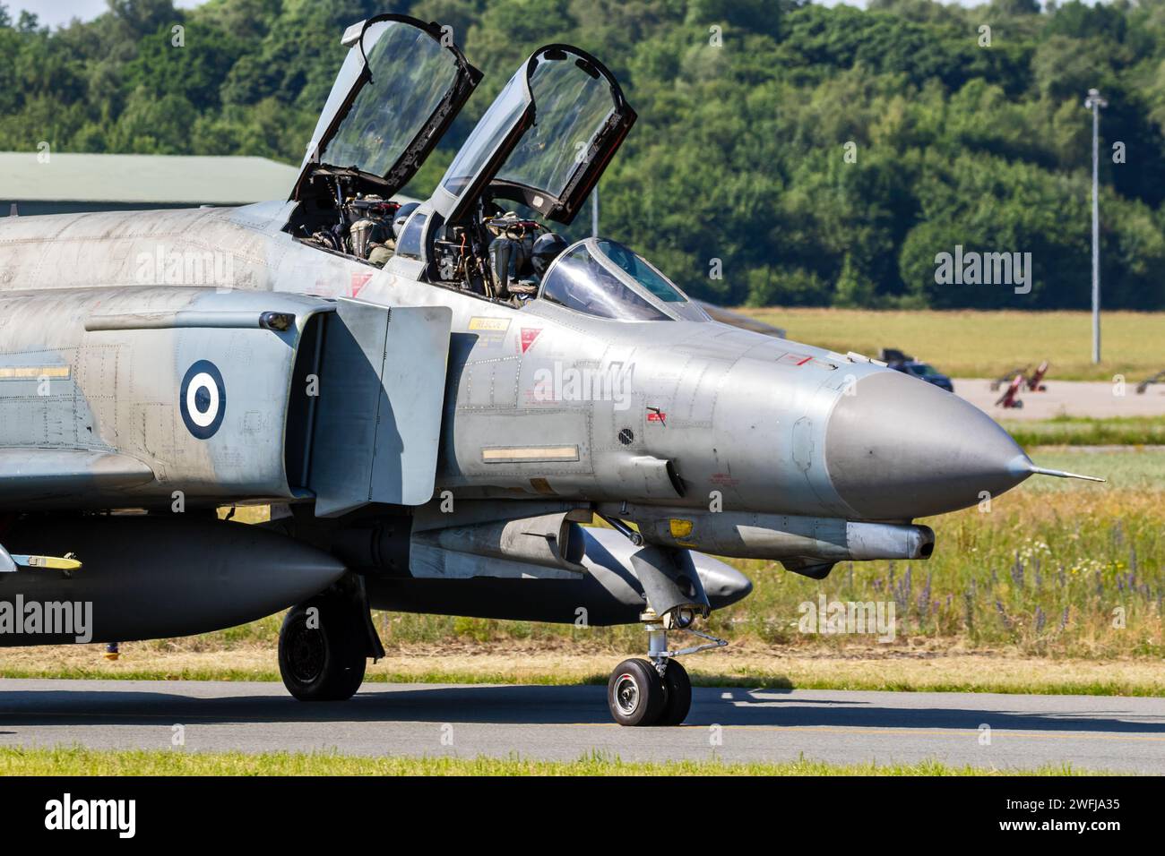 F-4 Phantom fighter jet from the Hellenic Air Force taxiing towards the runway of Florennes airbase. Belgium - June 15, 2017 Stock Photo