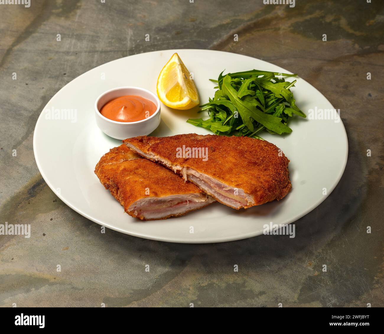 A Typical German or Austrian cordon bleu schnitzel filled with Gouda