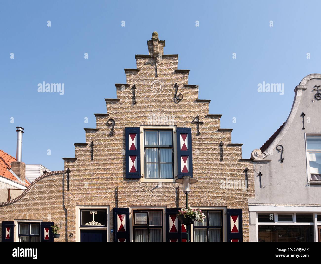 Stepped gable of house on Voorstraat in old town of Sint-Annaland, Tholen, Zeeland, Netherlands Stock Photo