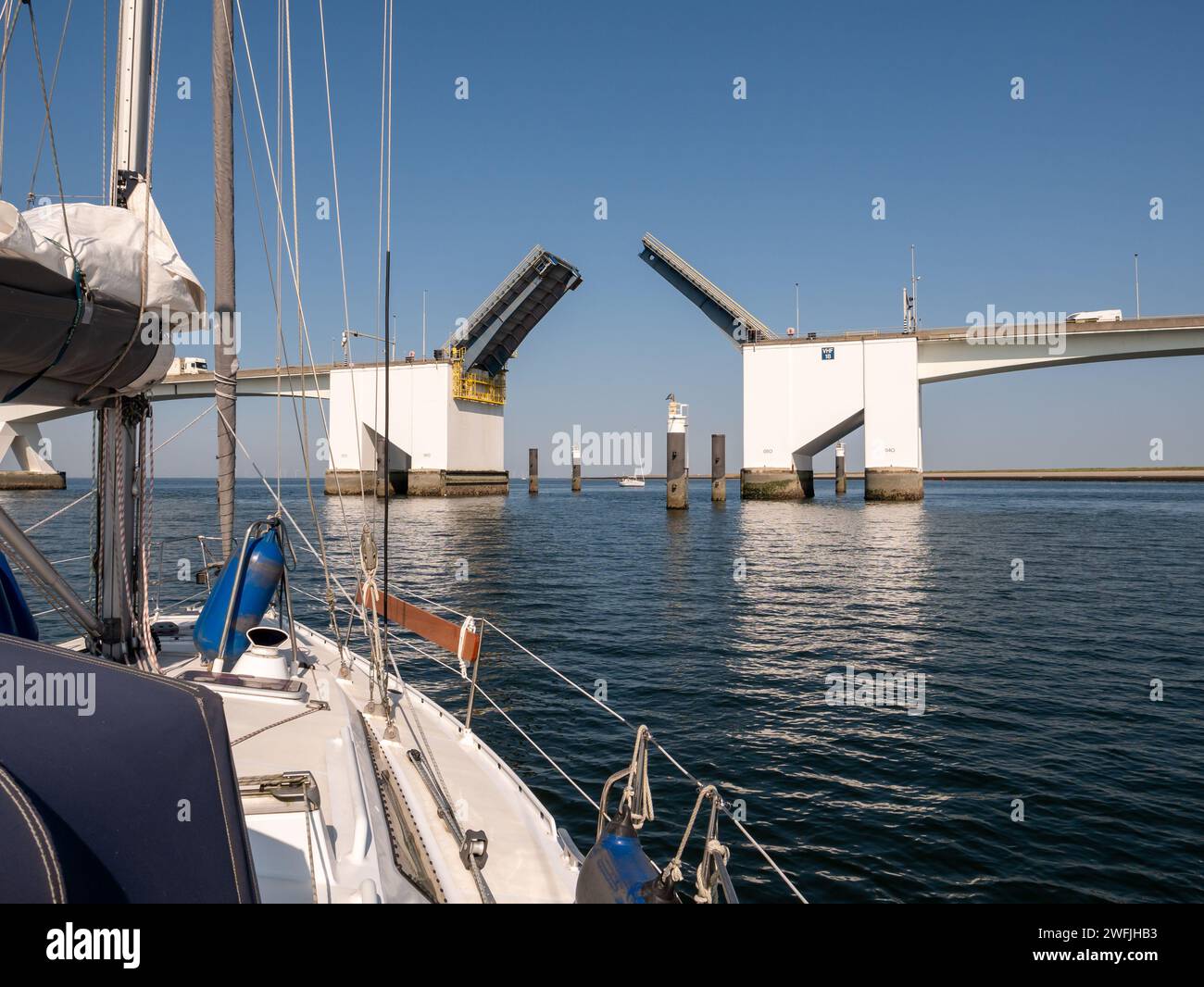 Bridge opening of Eastern Scheldt Bridge for sailboats with high masts, Eastern Scheldt, Zeeland, Netherlands Stock Photo