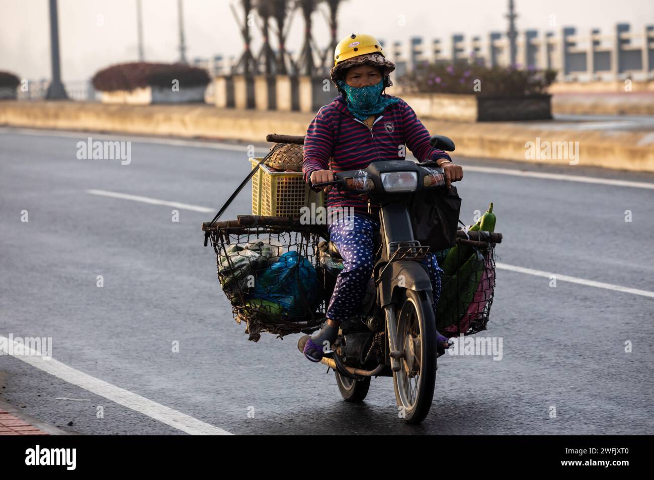 Vietnamese Motorcycle Rider Traffic in viet nam hi-res stock photography and images - Alamy