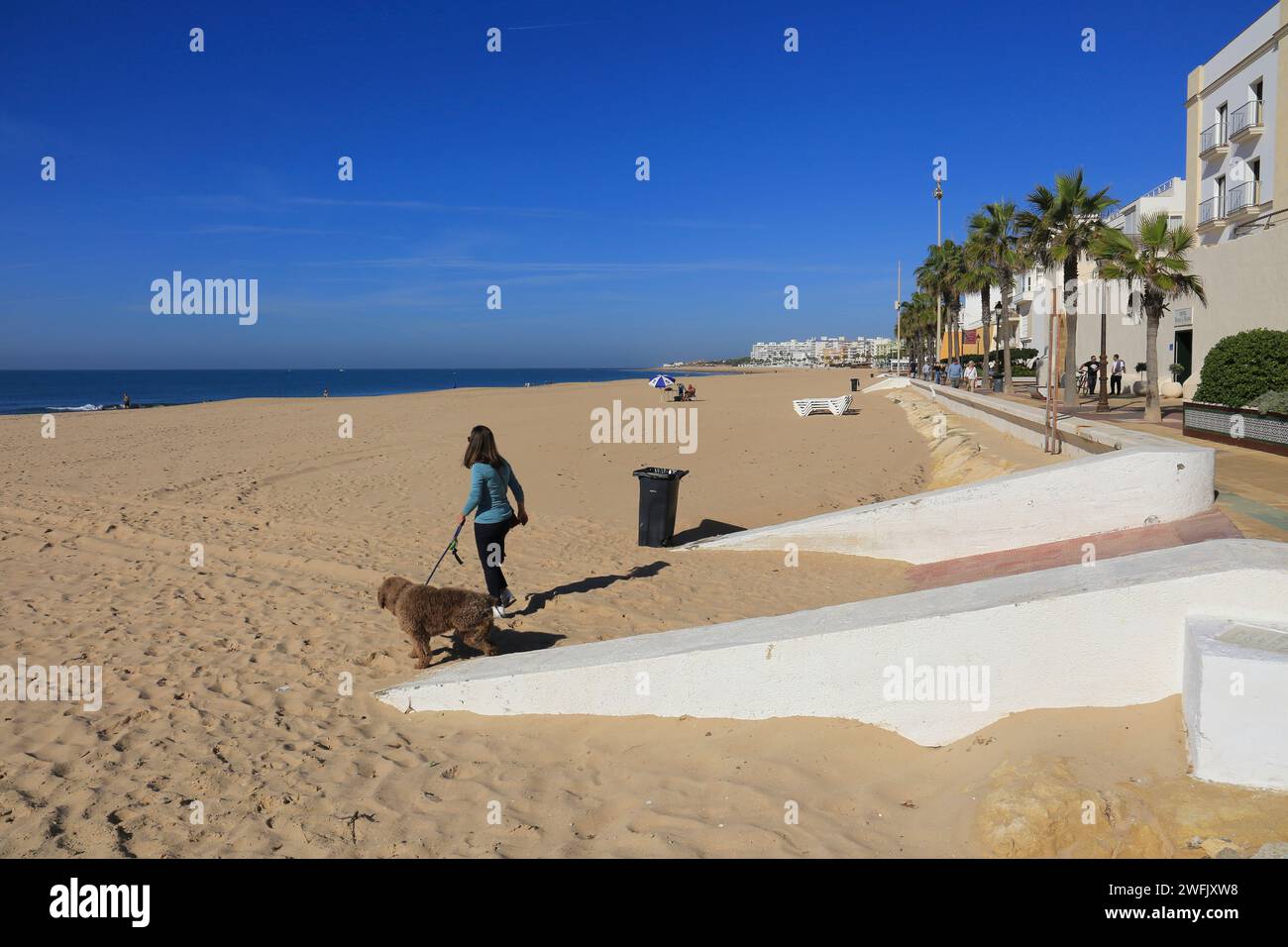 Rota, Cadiz, Spain- October 10, 2023:Playa de la Costilla beach and promenade in Rota city, Cadiz, on a sunny day Stock Photo