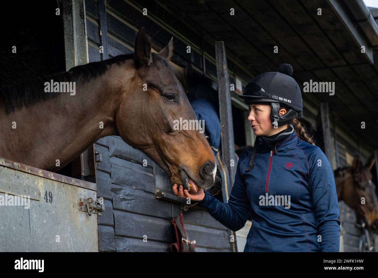 Jockey Bryony Frost with National Hunt race horse Frodon on his last day at Paul Nicholls' yard after his retirement. Stock Photo