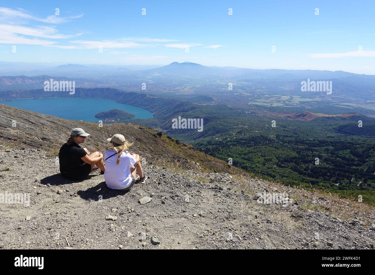 Tourists enjoying views from summit of Santa Ana volcano, El Salvador, Central America Stock Photo