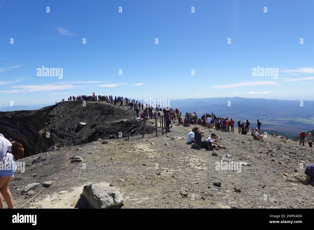 Crowds of tourists arriving at summit of Santa Ana volcano, El Salvador, Central America Stock Photo