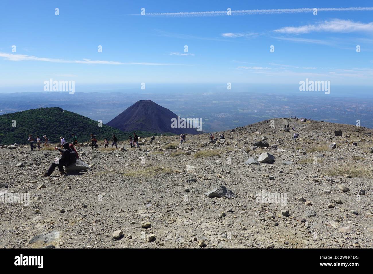 Tourists enjoying views from summit of Santa Ana volcano, El Salvador, Central America Stock Photo