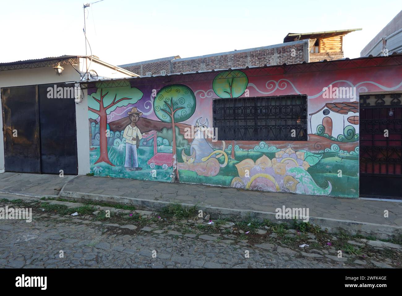 Murals on the walls of shops and houses in Concepcion de Ataco, Ahuachapan, El Salvador, Central America Stock Photo