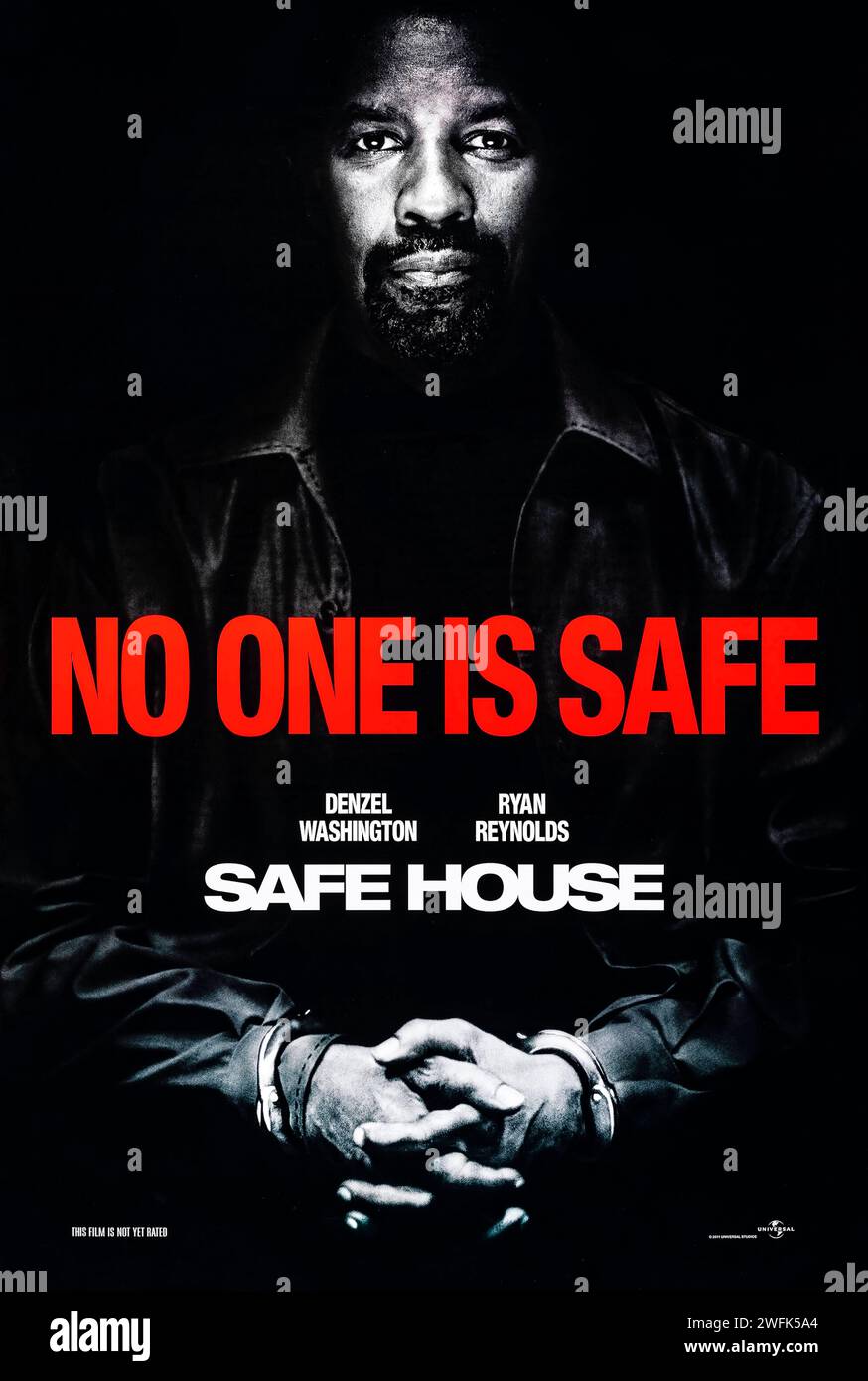 Safe House (2012) directed by Daniel Espinosa and starring Denzel Washington, Ryan Reynolds and Robert Patrick. A young CIA agent is tasked with looking after a fugitive in a safe house. But when the safe house is attacked, he finds himself on the run with his charge. Photograph of an original 2012 US teaser poster. ***EDITORIAL USE ONLY*** Credit: BFA / Universal Pictures Stock Photo