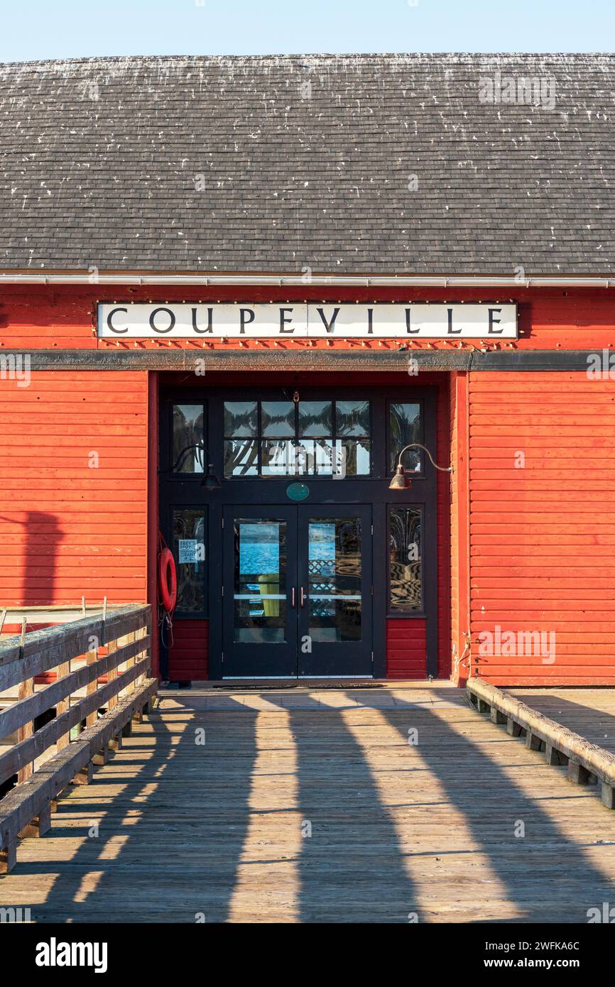 A vertical photo of the entrance to the mixeduse wharf building at