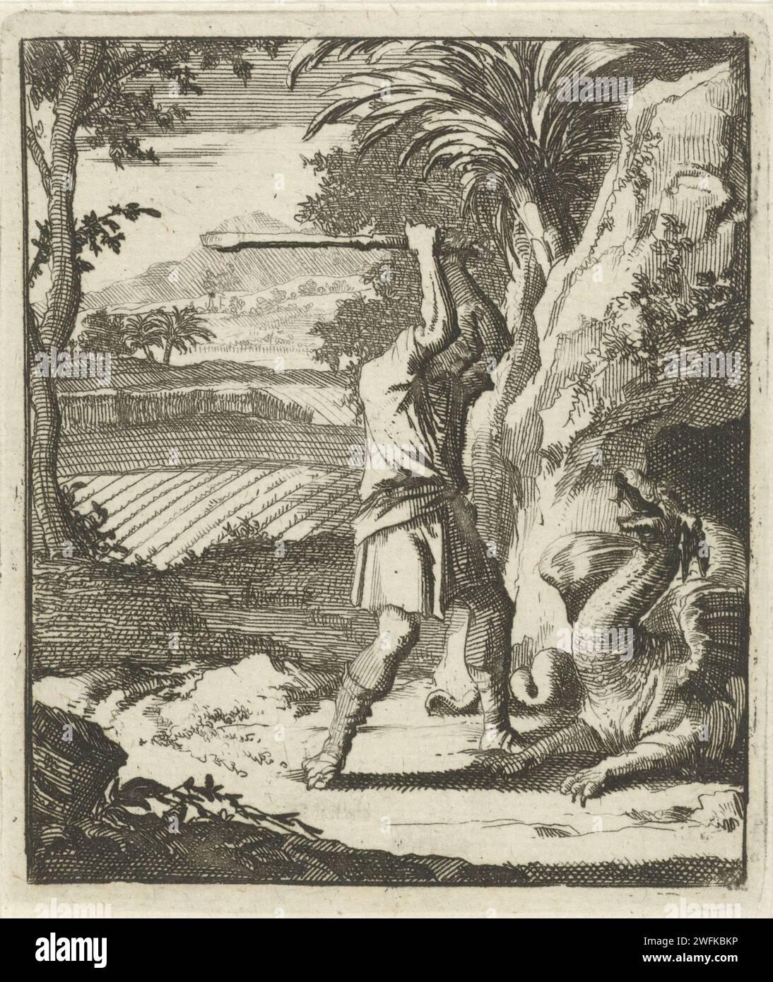 Man fights a dragon that has emerged from his cave, Jan Luyken, 1693 print  Amsterdam paper etching dragon. man killing animal Stock Photo