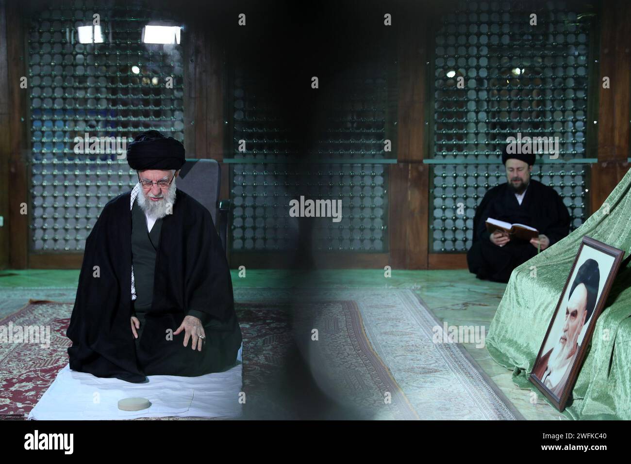Tehran, Iran. 31st Jan, 2025. Iranian Supreme Leader Ayatollah ALI KHAMENEI (L) praying inside