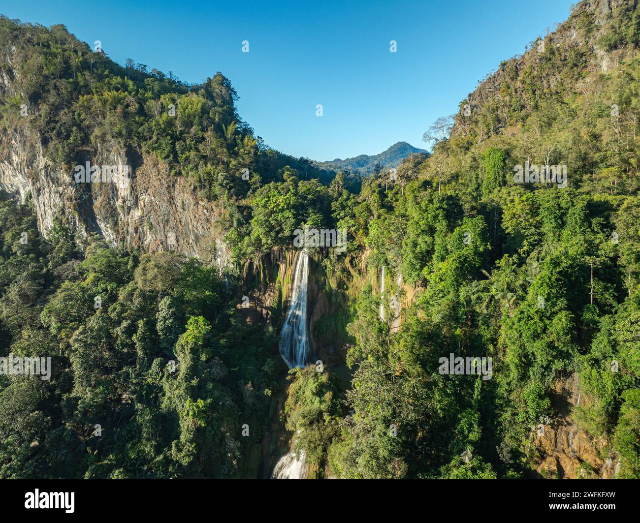 Aerial View Numerous waterfalls flow from wide, steep cliffs.  Thi Lor Su waterfall Nestled amidst the untouched beauty of Tak Province. Thi Lo Su Wat Stock Photo