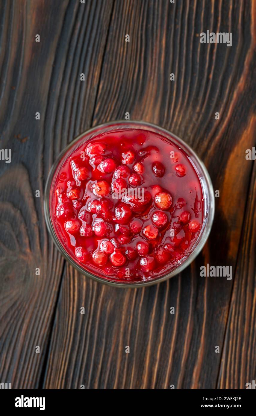 Glass bowl of traditional swedish lingonberry sauce Stock Photo