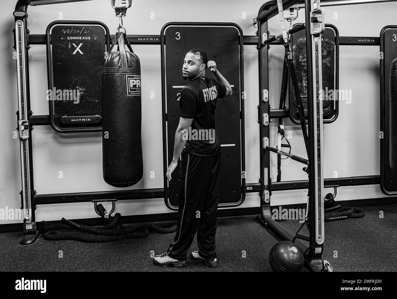 Fitness coach at the local gym during fitness training session Stock Photo