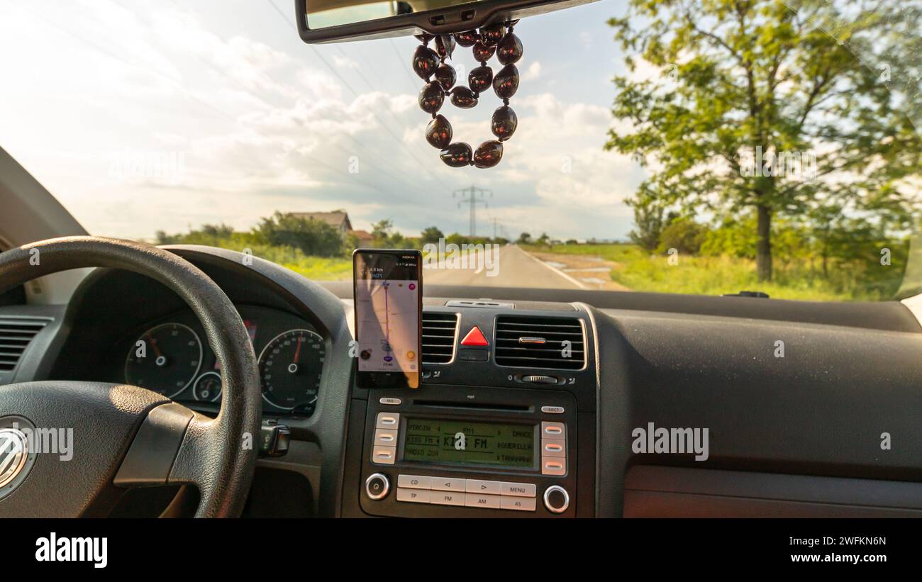 Waze maps showing the way thru the city. Driver using Waze maps Stock ...