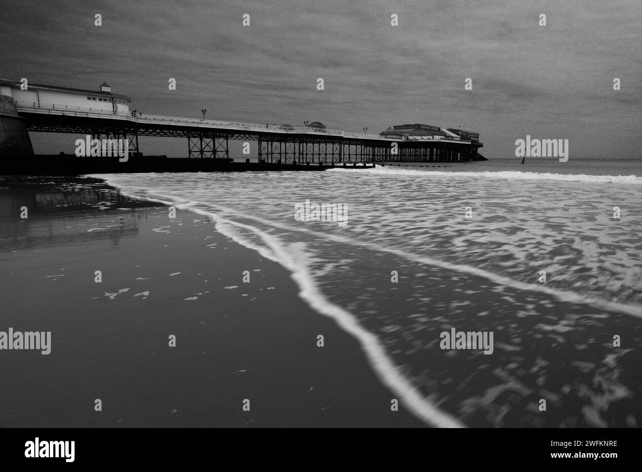 The promenade and Pavilion Theatre Pier at Cromer town, North Norfolk Coast, England, UK Stock Photo