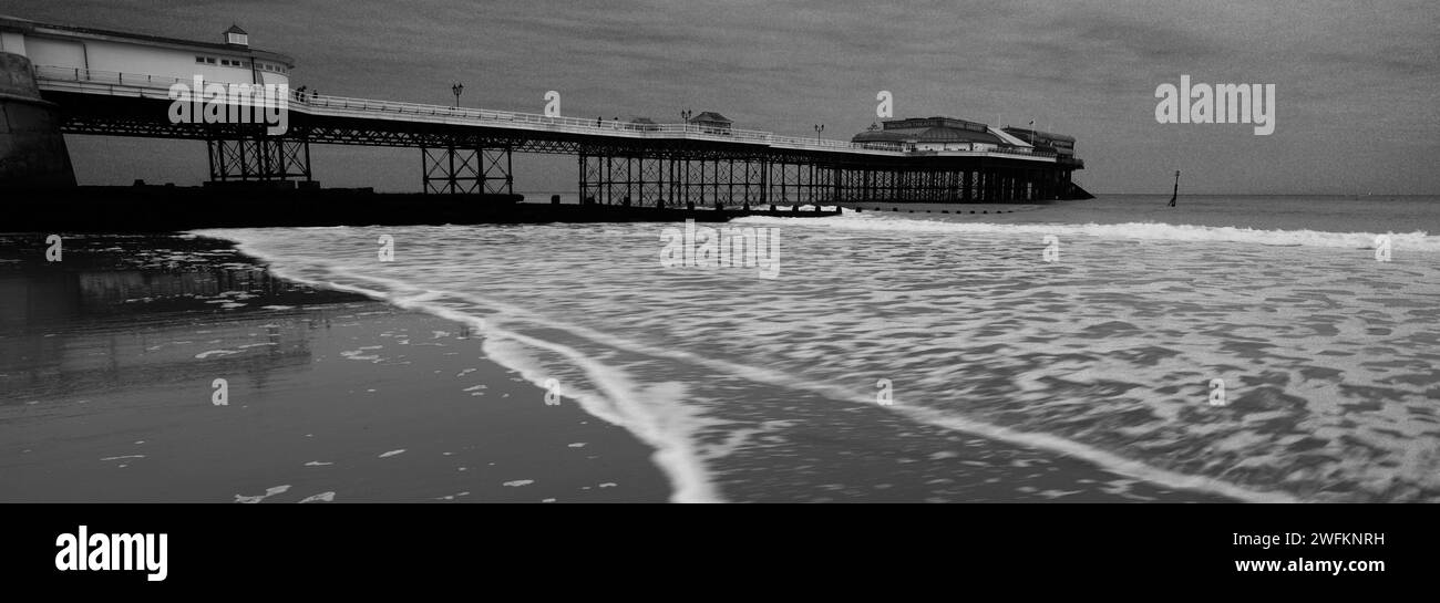 The promenade and Pavilion Theatre Pier at Cromer town, North Norfolk Coast, England, UK Stock Photo