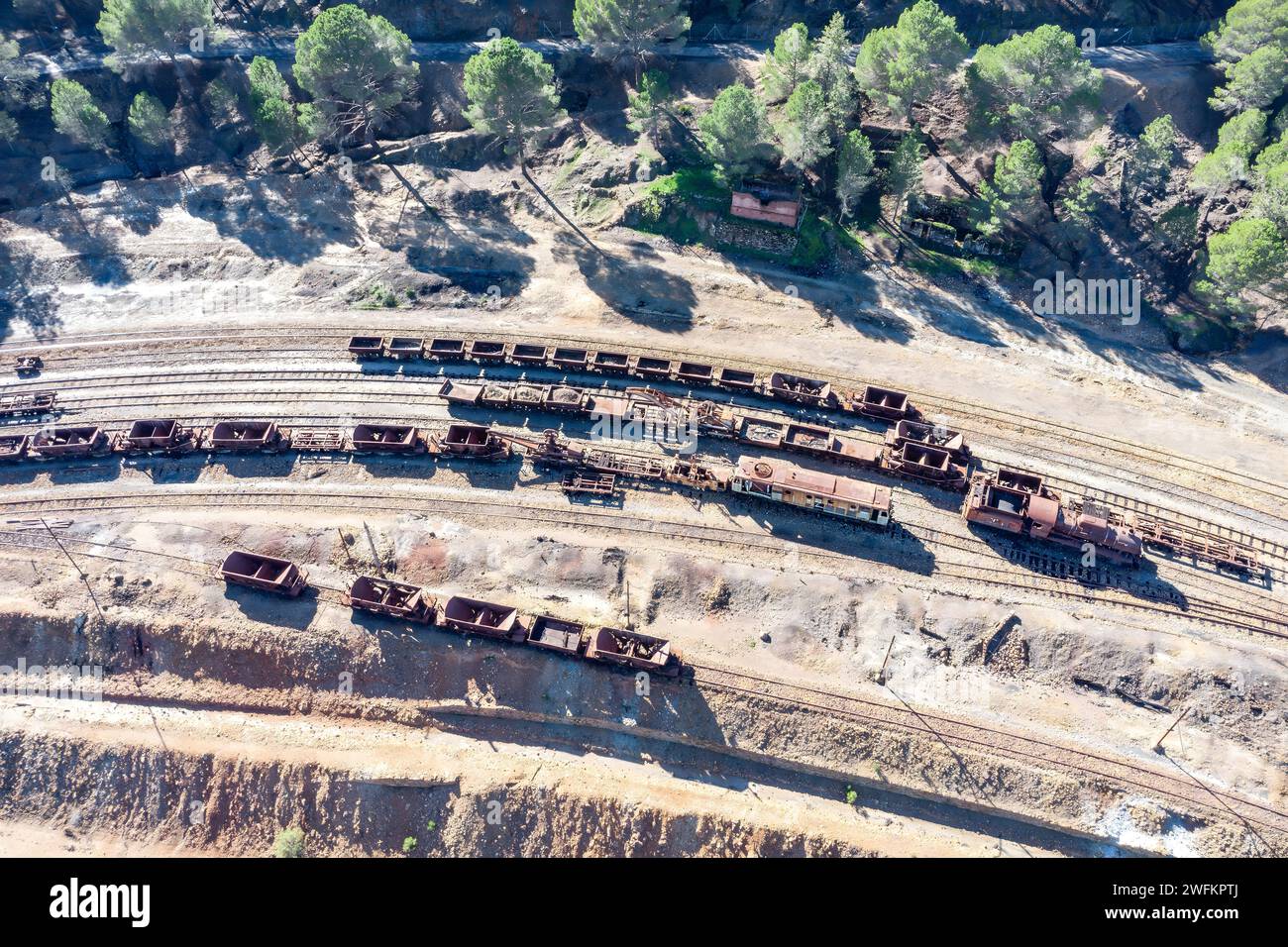 Aerial drone view of an old and rusty remains of the old copper mining exploitation in Minas de Riotinto, used for excavation and transportation of th Stock Photo