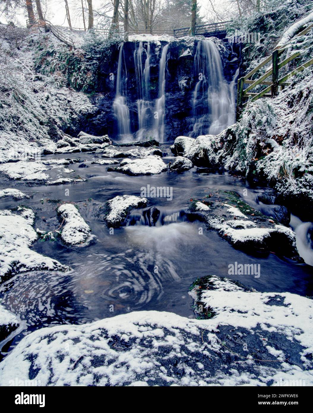Snow and Ice at Ess-na-Crub Waterfall at Glenariff Forest Park, County Antrim, Northern Ireland Stock Photo