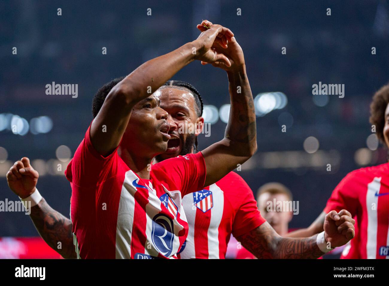 Madrid, Madrid, Spain. 31st Jan, 2024. Reinildo Mandava of Atletico Madrid seen celebrating his goal with his teammates during the La Liga EA Sports 2023/24 football match between Atletico Madrid vs Rayo Vallecano at Metropolitano stadium in Madrid, Spain. (Credit Image: © Alberto Gardin/ZUMA Press Wire) EDITORIAL USAGE ONLY! Not for Commercial USAGE! Stock Photo