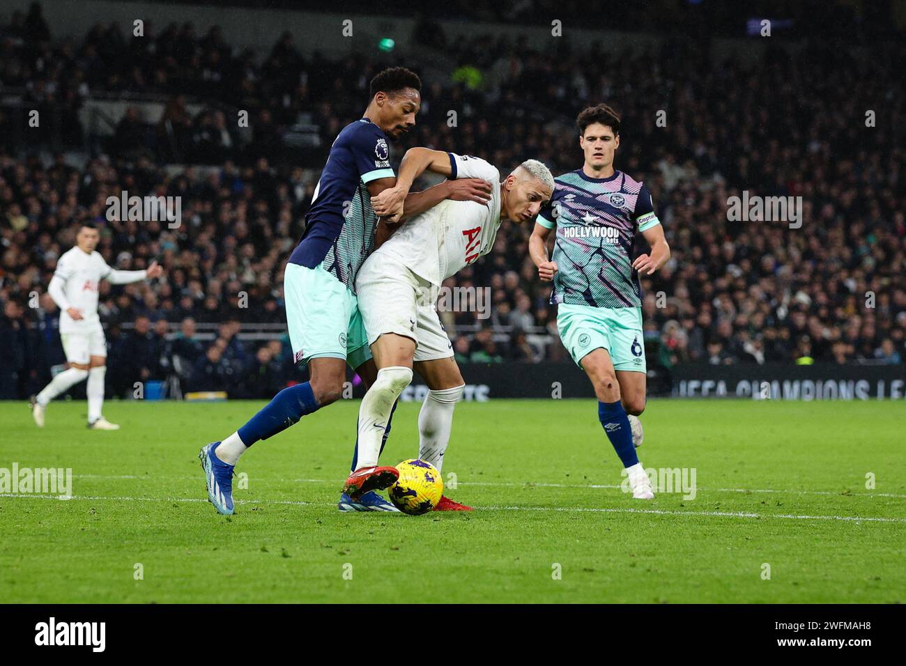 LONDON, UK - 31st Jan 2024:  Richarlison of Tottenham Hotspur holds off the challenge from Ethan Pinnock of Brentford during the Premier League match between Tottenham Hotspur and Brentford FC at Tottenham Hotspur Stadium  (Credit: Craig Mercer/ Alamy Live News) Stock Photo