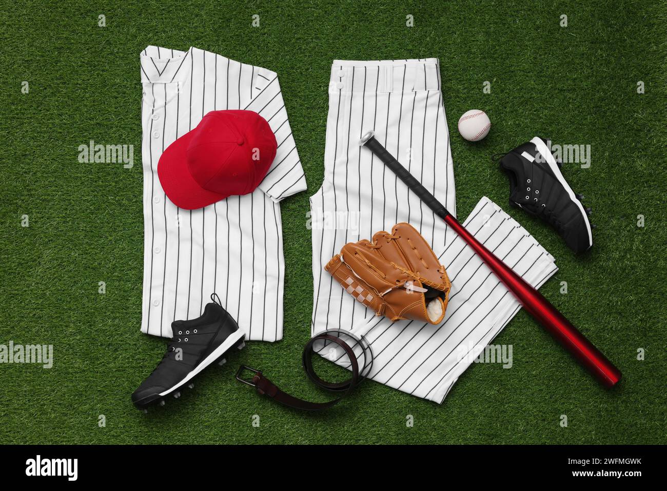 Baseball equipment on grass hi-res stock photography and images - Alamy