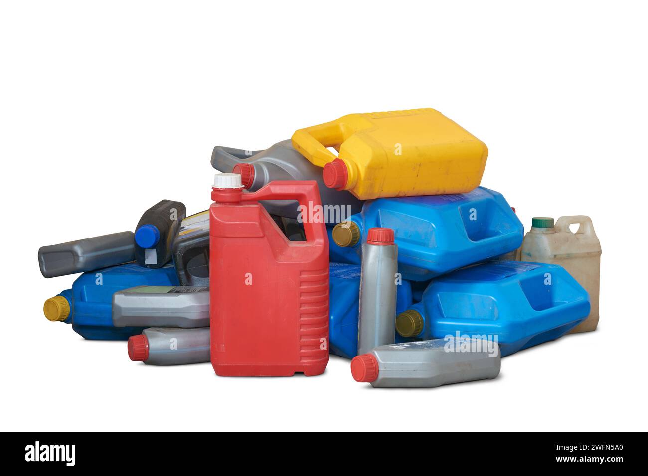 pile of old used plastic oil cans, motor or engine oil chemical gallon for recycle, various sizes and colors of empty waste containers or canisters Stock Photo