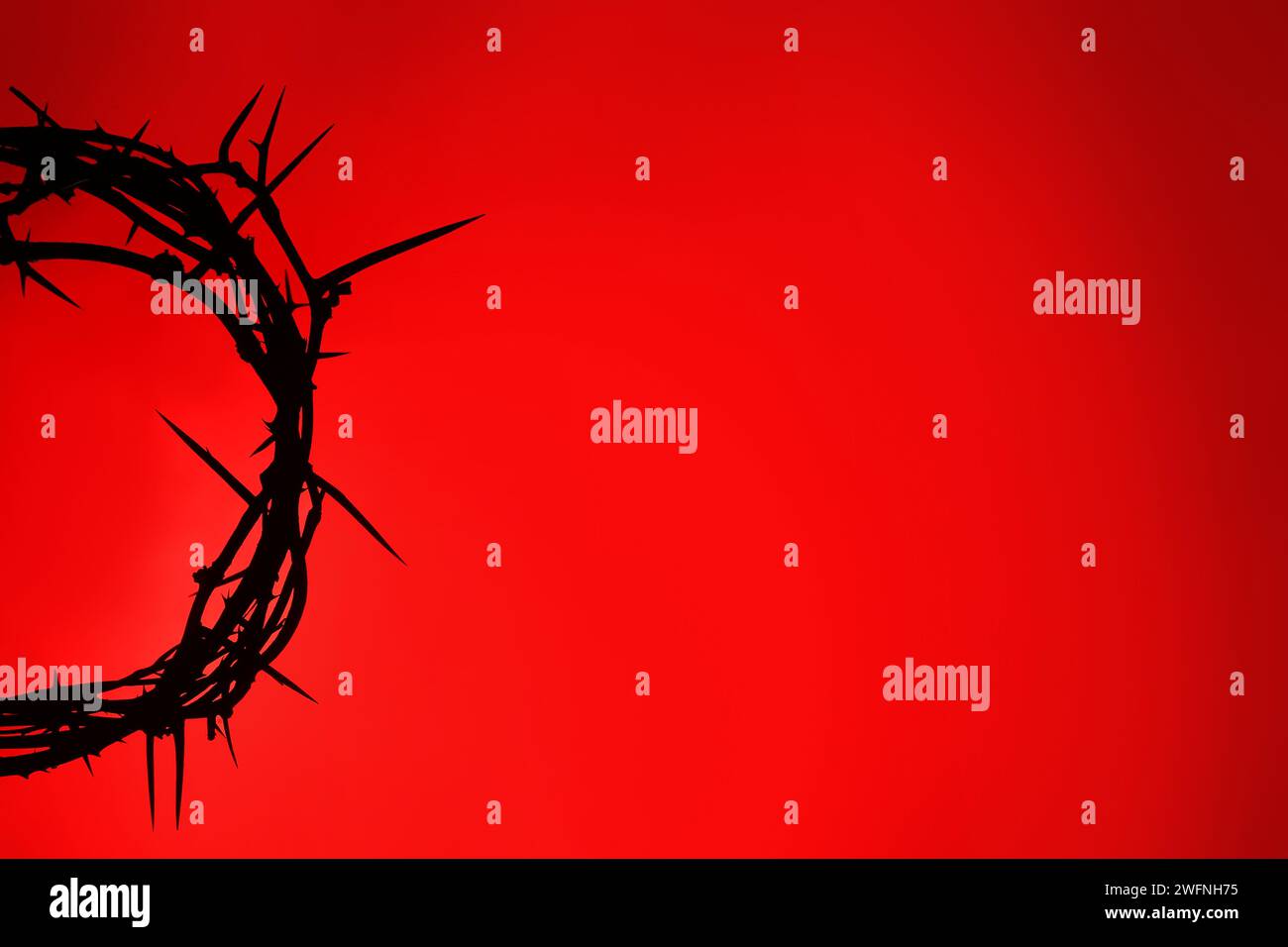 Crown of thorns on red background Stock Photo - Alamy
