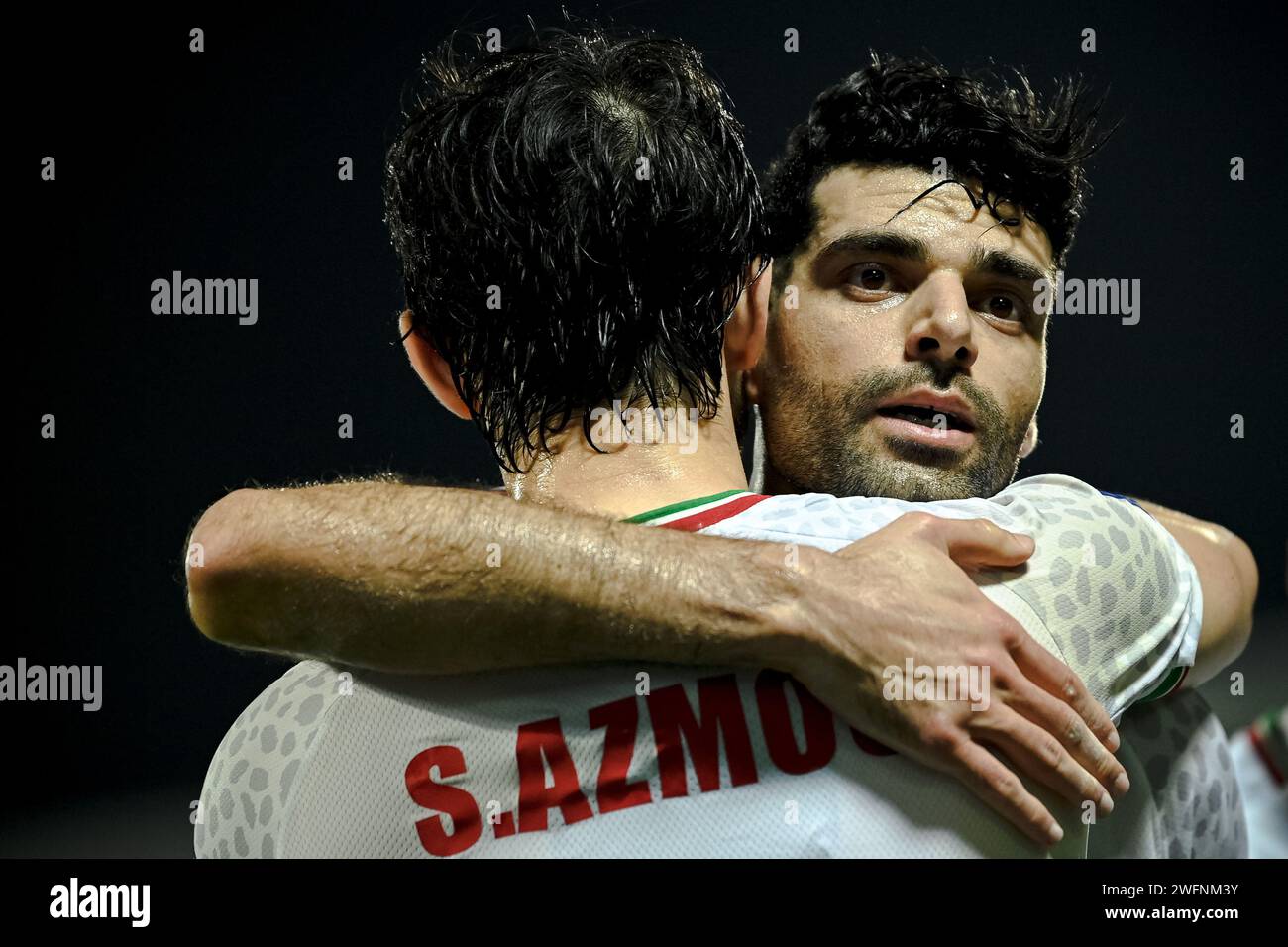 Doha, Qatar. 31st Jan, 2024. Mehdi Taremi (R) of Iran celebrates scoring their first goal from the penalty spot with his teammate Sardar Azmoun during the round of 16 match between Iran and Syria at AFC Asian Cup Qatar 2023 in Doha, Qatar, Jan. 31, 2024. Credit: Jiang Han/Xinhua/Alamy Live News Stock Photo