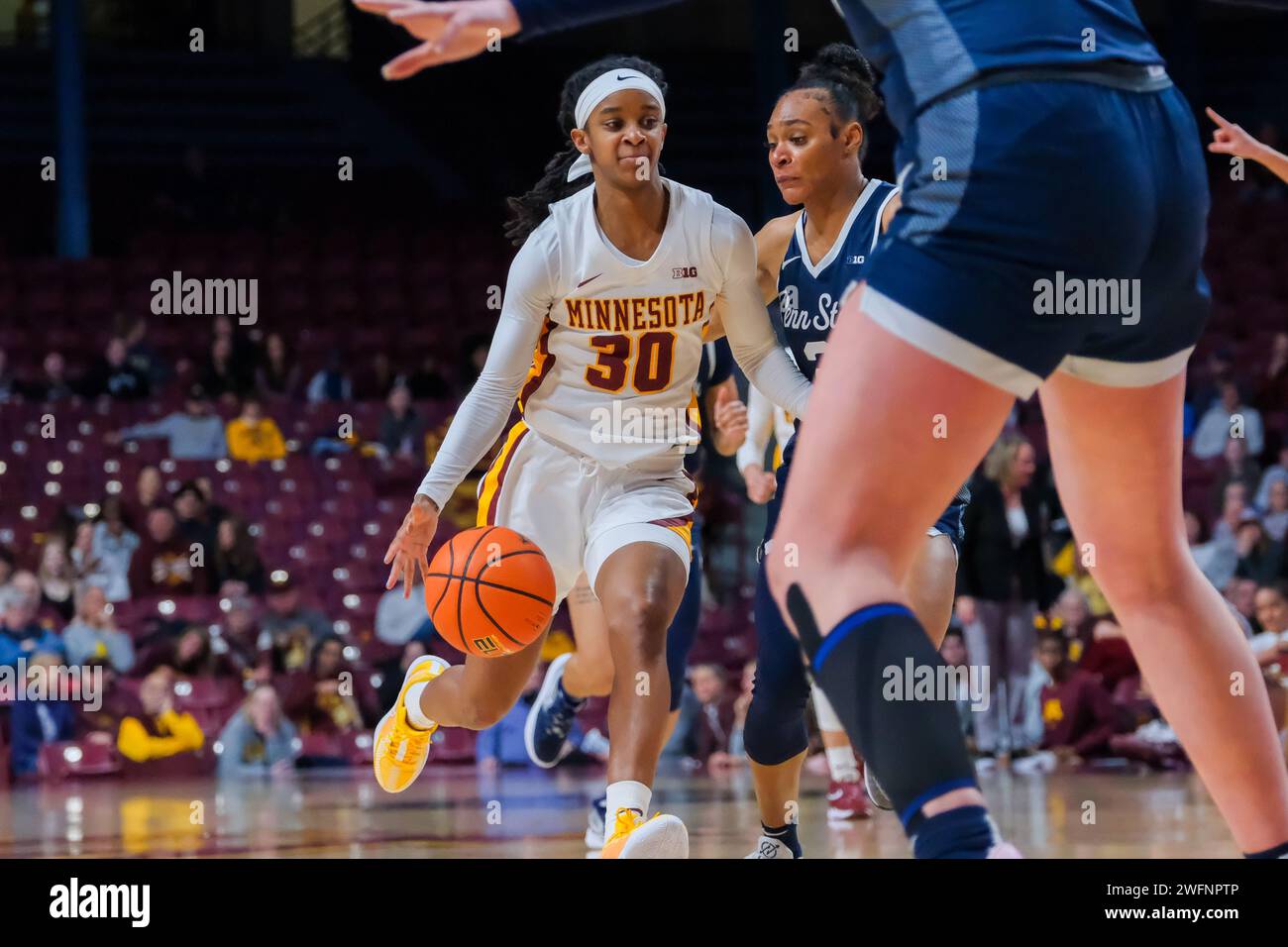 Minneapolis, Minnesota, USA. 31st Jan, 2024. Minnesota Golden Gophers guard JANAY SANDERS (30) drives the ball in the first half of a NCAA Women's basketball game between the University of Minnesota and Penn State on January 31st, 2024 at Williams Arena in Minneapolis, MN. Penn State won 80-64. (Credit Image: © Steven Garcia/ZUMA Press Wire) EDITORIAL USAGE ONLY! Not for Commercial USAGE! Stock Photo