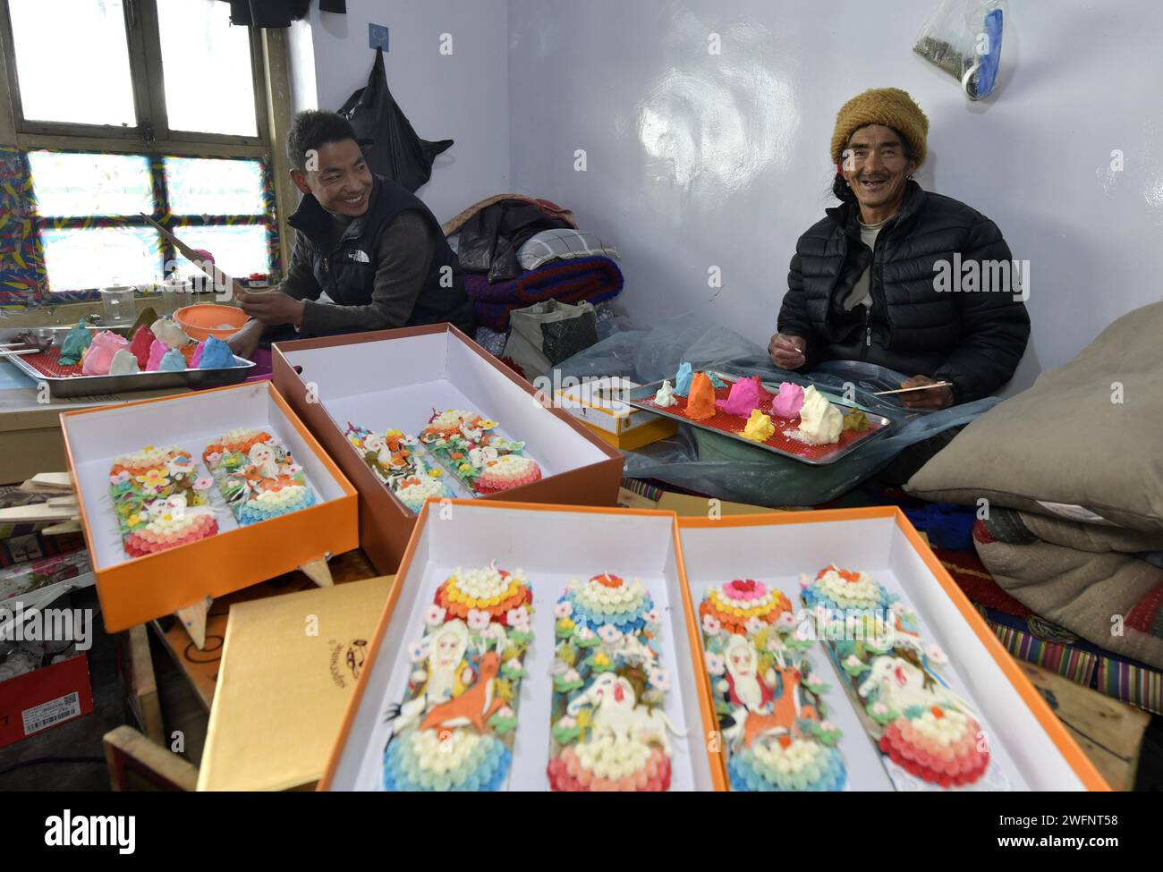 **CHINESE MAINLAND, HONG KONG, MACAU AND TAIWAN OUT** Craftsmen make butter sculptures to greet the upcoming Losar, or Tibetan New Year in Lhasa City, Stock Photo