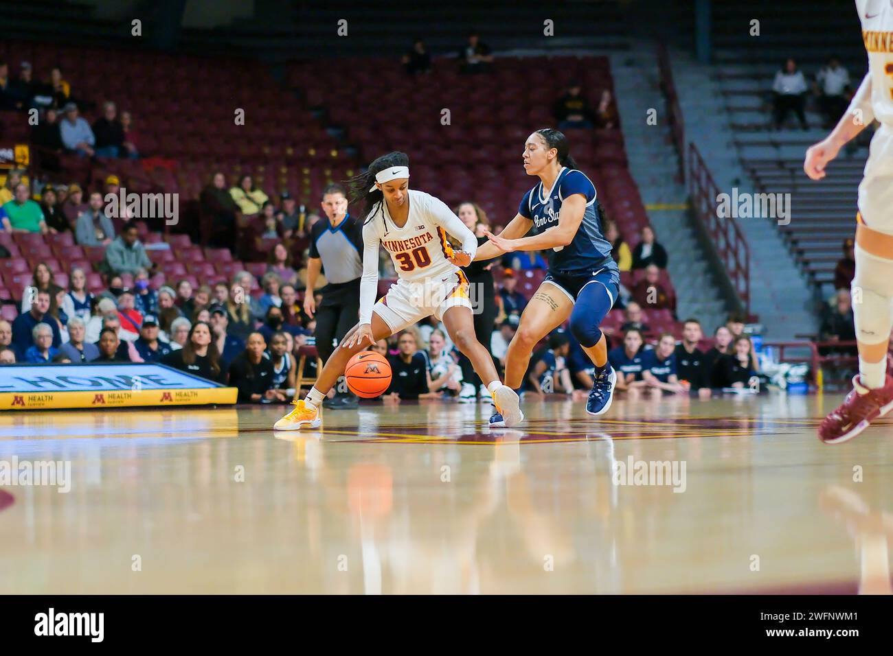 Minneapolis, Minnesota, USA. 31st Jan, 2024. Minnesota Golden Gophers guard JANAY SANDERS (30) defends against Penn State Nittany Lions guard LEILANI KAPINUS (5) in the second half of a NCAA Women's basketball game between the University of Minnesota and Penn State on January 31st, 2024 at Williams Arena in Minneapolis, MN. Penn State won 80-64. (Credit Image: © Steven Garcia/ZUMA Press Wire) EDITORIAL USAGE ONLY! Not for Commercial USAGE! Stock Photo