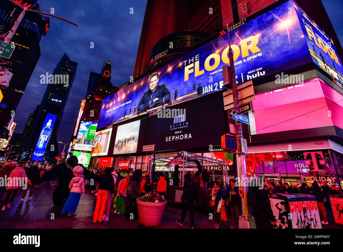 Times Square at night with lighted billboards Stock Photo