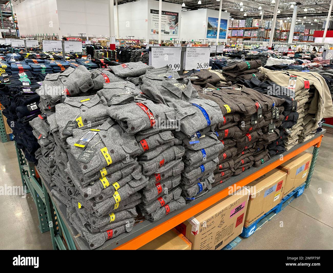 Shirts and jackets sit in display in a C?ostco warehoue Tuesday, Jan ...